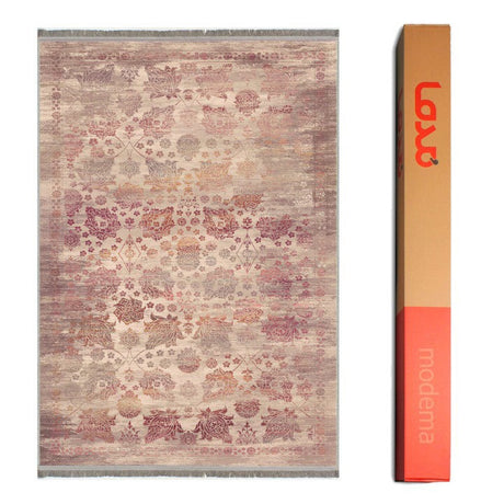 Alfombra vintage 'Rose' sobre un fondo blanco con el embalaje visible en el lado opuesto. El diseño con motivos florales y geométricos en tonos crema, rosas y rojos añade elegancia, y es lavable en lavadora.